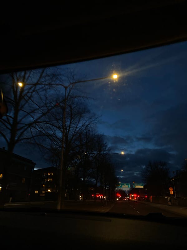 Night traffic view captured through car window in Uppsala