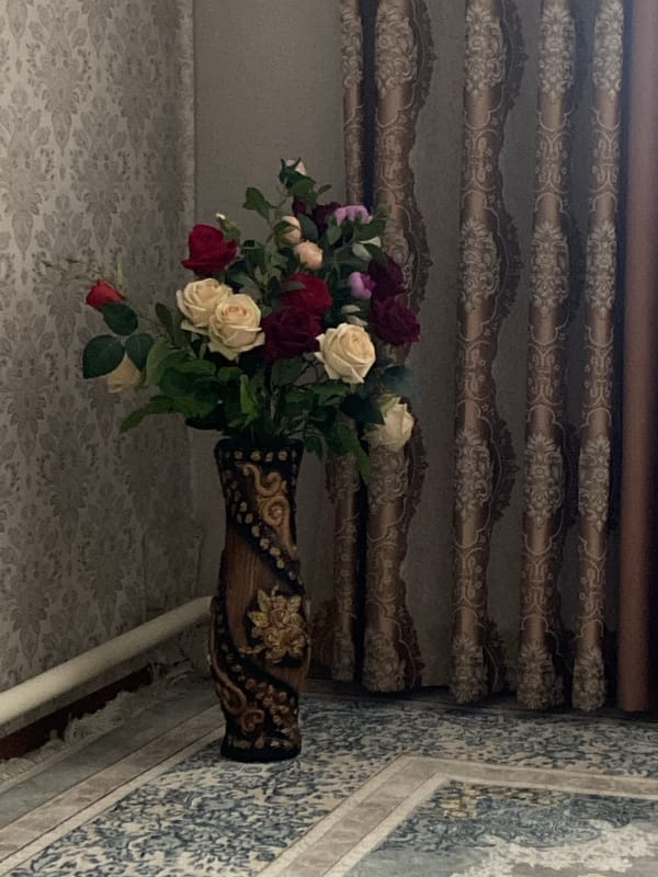 Decorative flower arrangement observed in Bishkek home setting