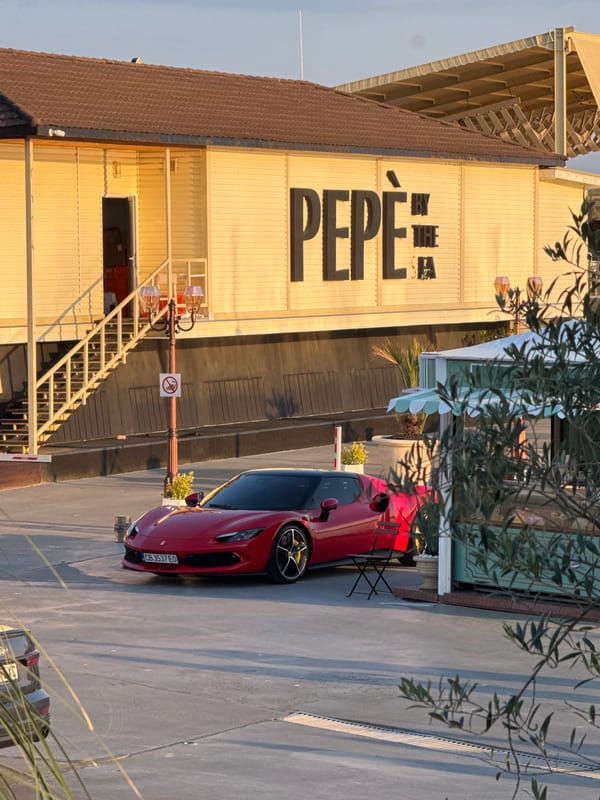 Red Ferrari parked in evening light, Sveti Vlas