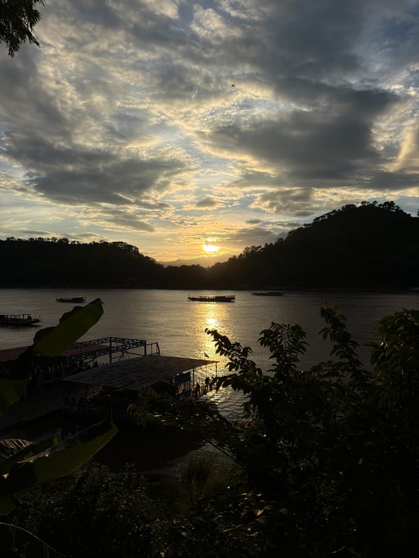 Mekong River life at golden hour, Luang Prabang