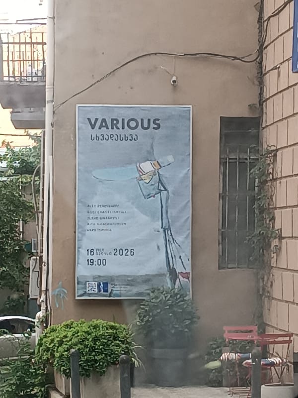 Street-level details from Tbilisi: architecture, public art, and signage