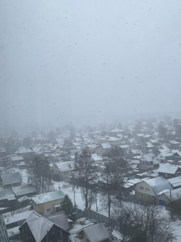 Heavy snowfall blankets residential Izhevsk, Russia morning hours