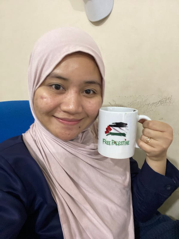 Morning at a Banjarbaru school, with a Free Palestine mug front and center