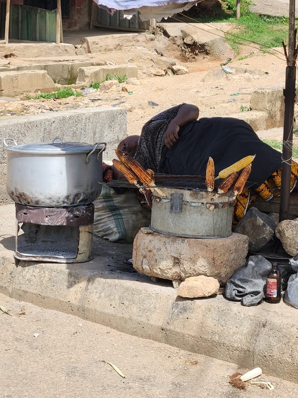 Street vendors conduct business in Kabong, Nigeria