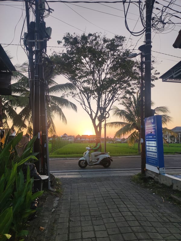 Sunset street scene captured in North Kuta, Indonesia