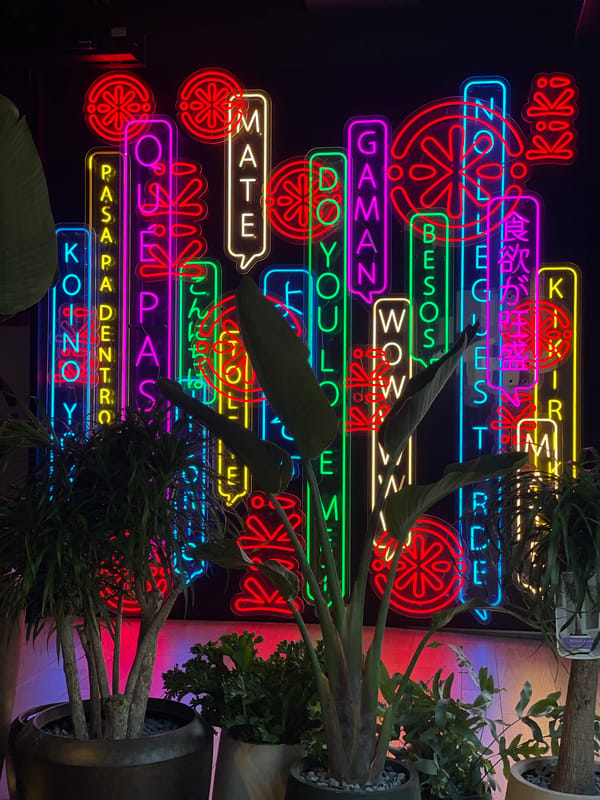 Colorful neon sign display captured at Tenerife venue