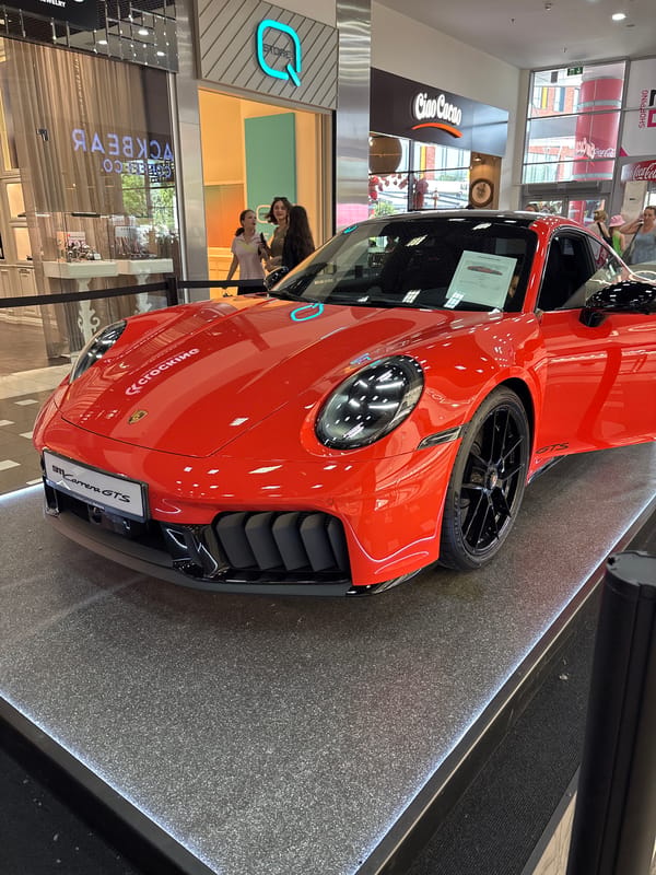 Porsche 911 showroom display at a Chișinău shopping mall