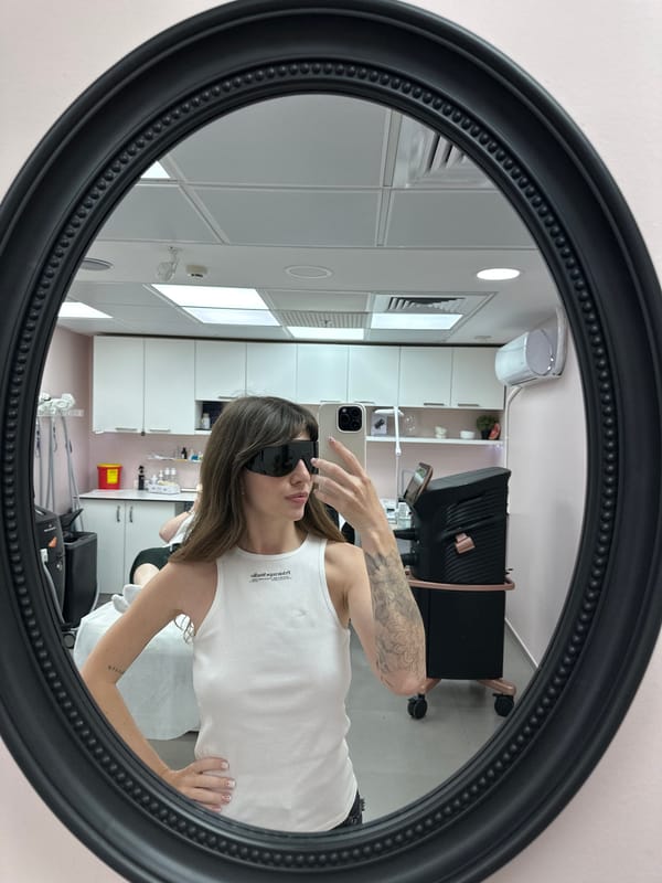 Person documents cosmetic laser treatment at Tel-Aviv studio