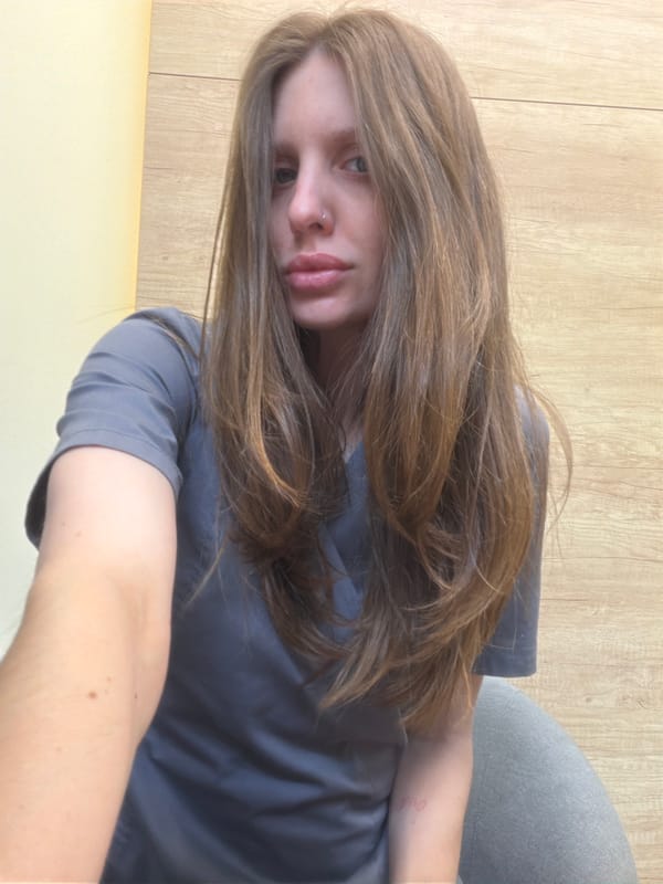 Healthcare worker takes selfies at Moscow medical facility