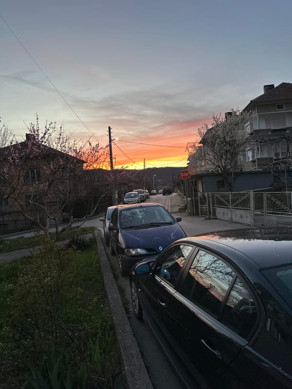 Sunset colors illuminate residential street in Dryanovo, Bulgaria