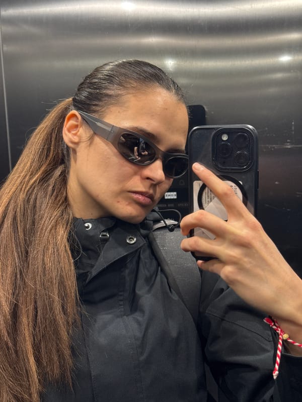 Woman Takes Selfie in Mirrored Space in Copenhagen