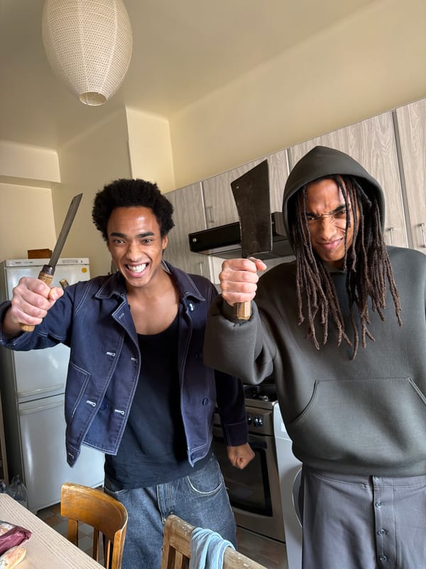 Two men photographed in residential kitchen in Strasbourg