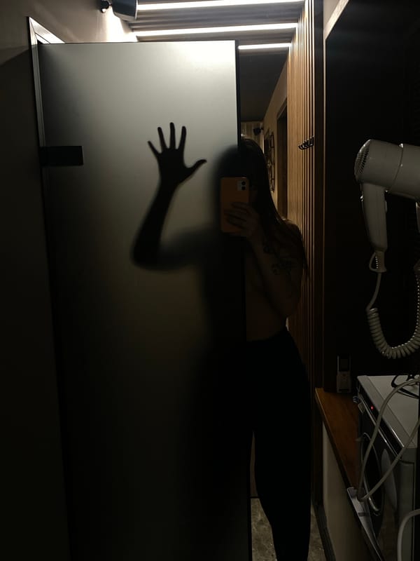 Person takes selfies indoors in Votkinsk, Russia