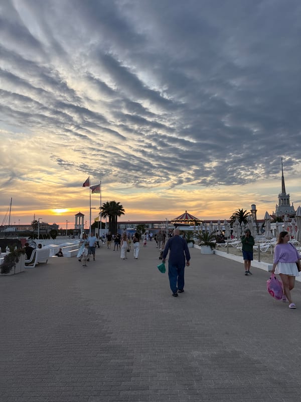 Sochi's Black Sea promenade at golden hour