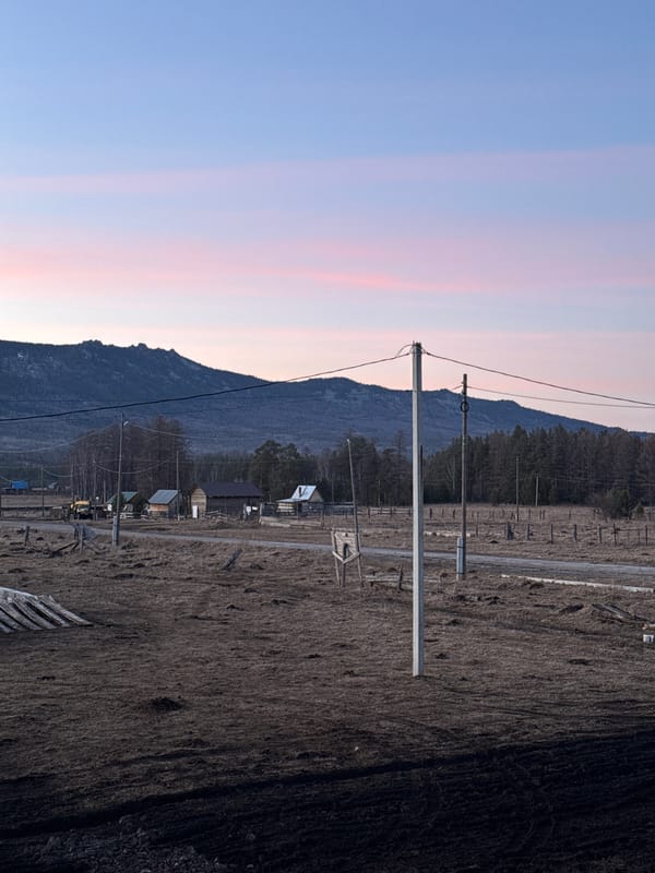 Rural photography session captures birdhouses and moonrise in Tyulyuk