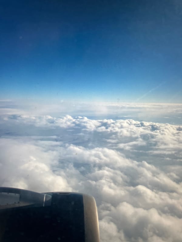 In-flight views: cabin life and clouds from above