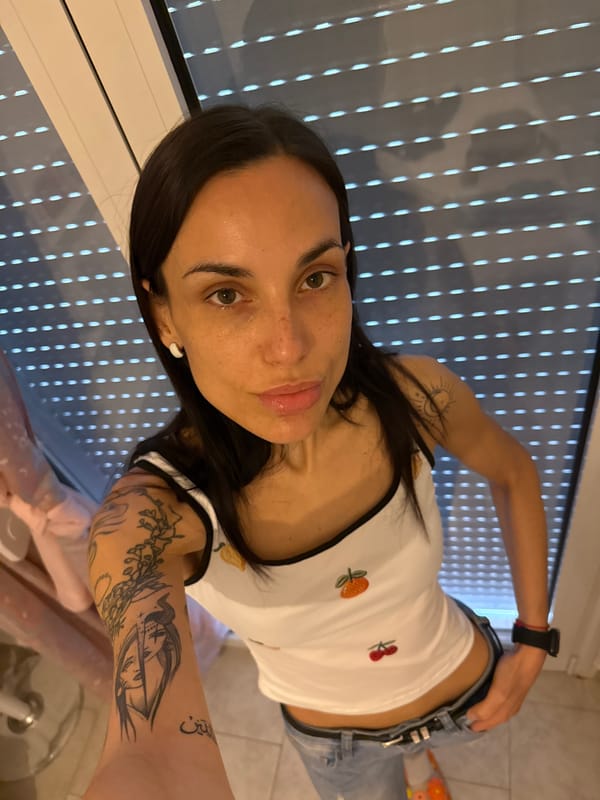 Woman's morning coffee routine documented in Chania, Greece