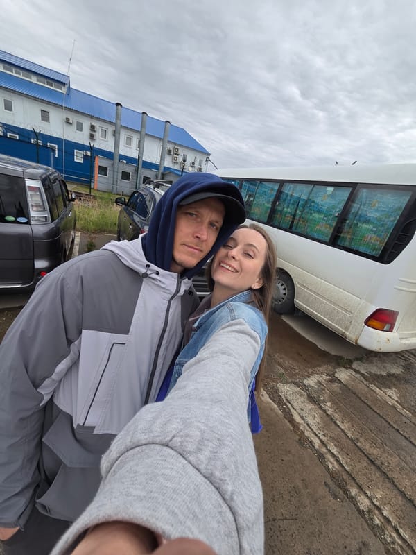 Couple documents overcast day outing in rural Russia