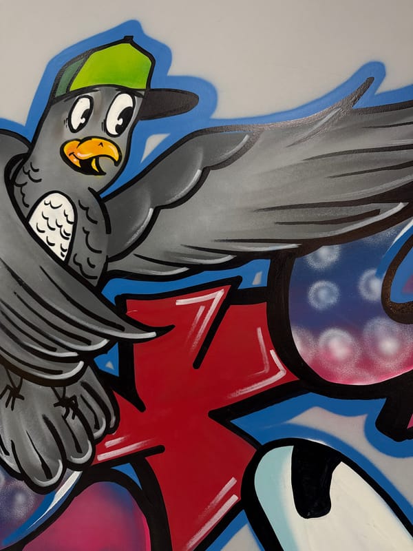 Vibrant bird graffiti mural documented in Vladivostok, Russia