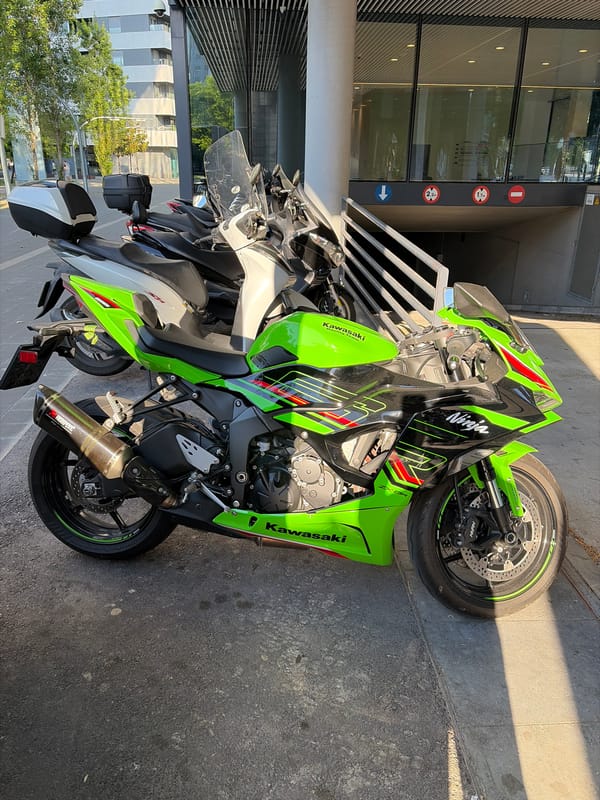 Kawasaki Ninja motorcycle parked during playground activity in L'Hospitalet