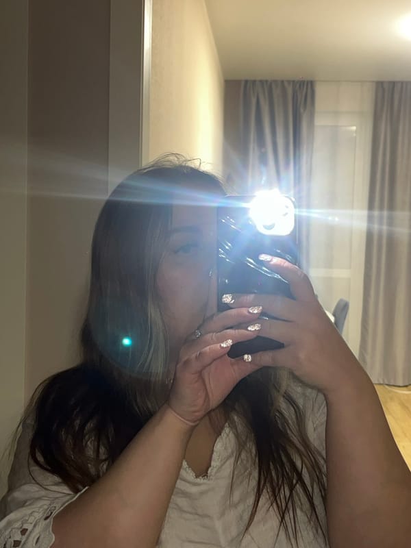 Woman takes selfies indoors in Krasnodar, Russia