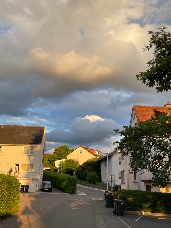 Golden and stormy skies collide over Neukirchen neighborhood
