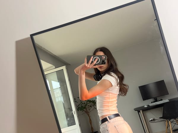 Person takes mirror selfies in Ternopil, Ukraine room