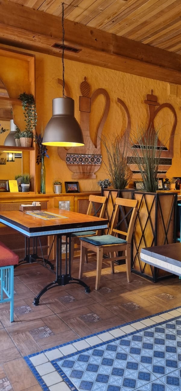 Warm, decorated cafe interior in Simferopol