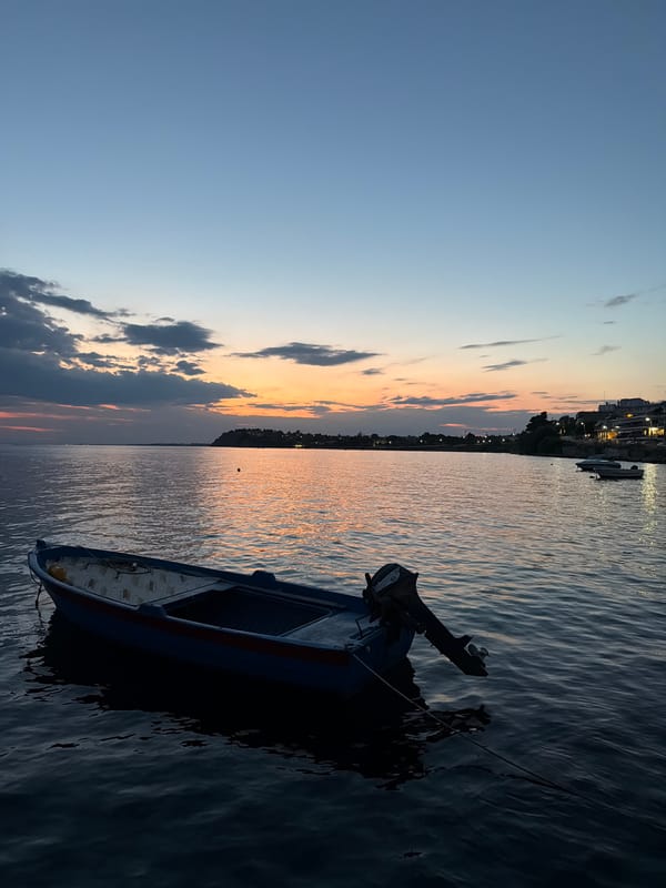 Small moored boat at dusk, Nea Irakleia shoreline