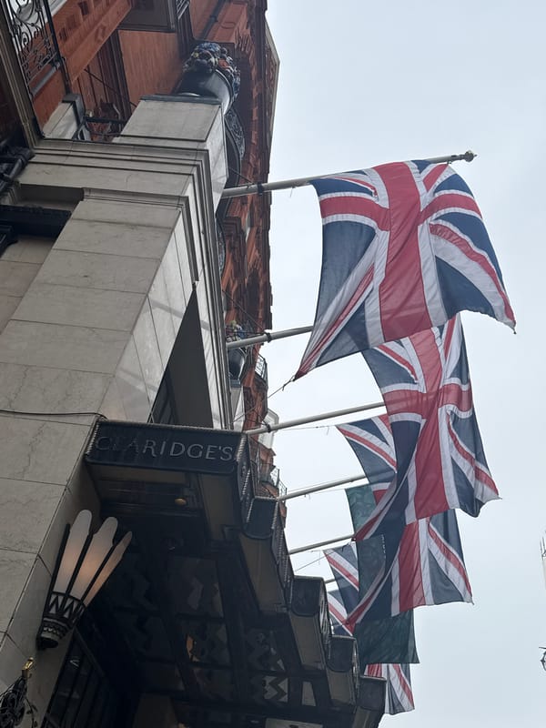London morning scenes: hotel flags, craft displays, breakfast setting