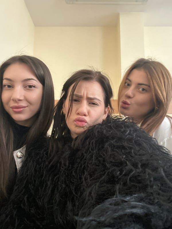 Three women pose for playful photos in Plovdiv