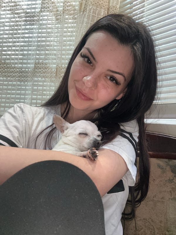 Woman photographs with pet dog around Sliven, Bulgaria