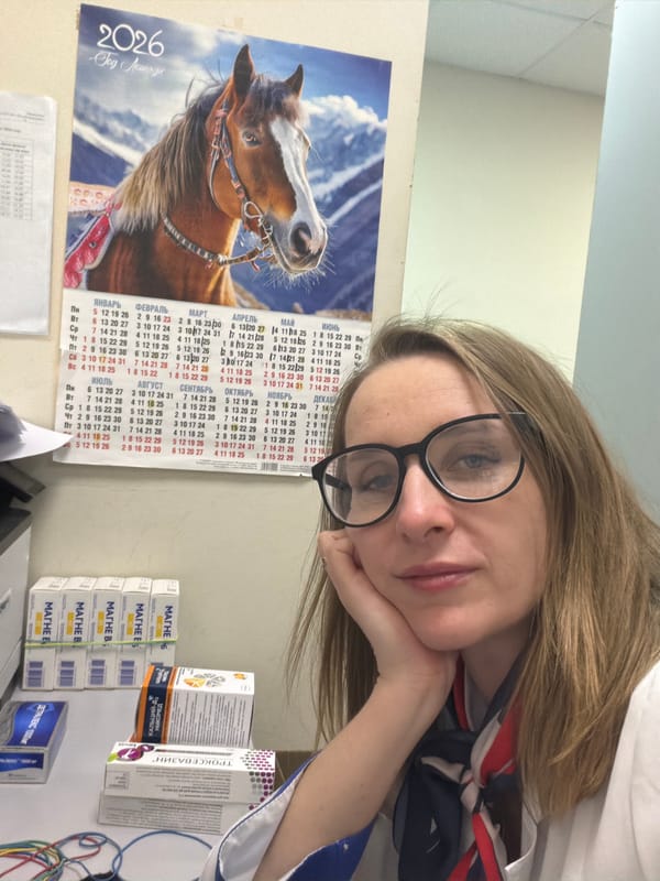 Woman rests near calendar and medications in Zaprudnya