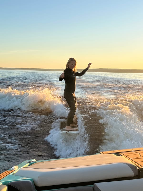Sunset wakesurf session on a Russian lake