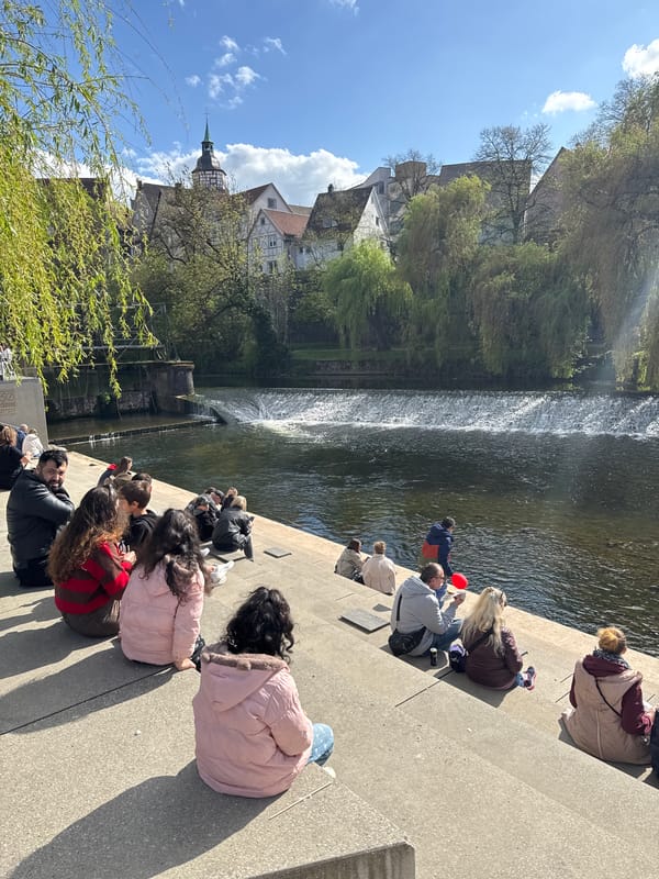 Afternoon gathering along Murr River waterfront in Backnang