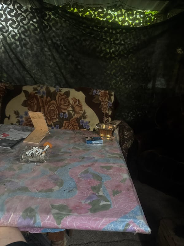 Backyard hangout scene with one unusual munitions room outlier
