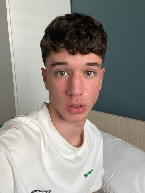 Young man records playful selfie session in Turin apartment