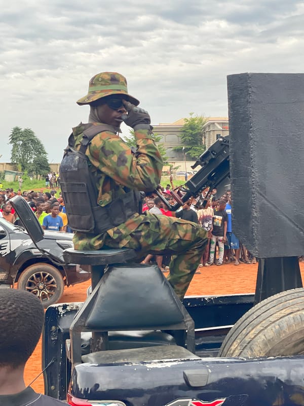 Soccer match with military presence draws large crowd