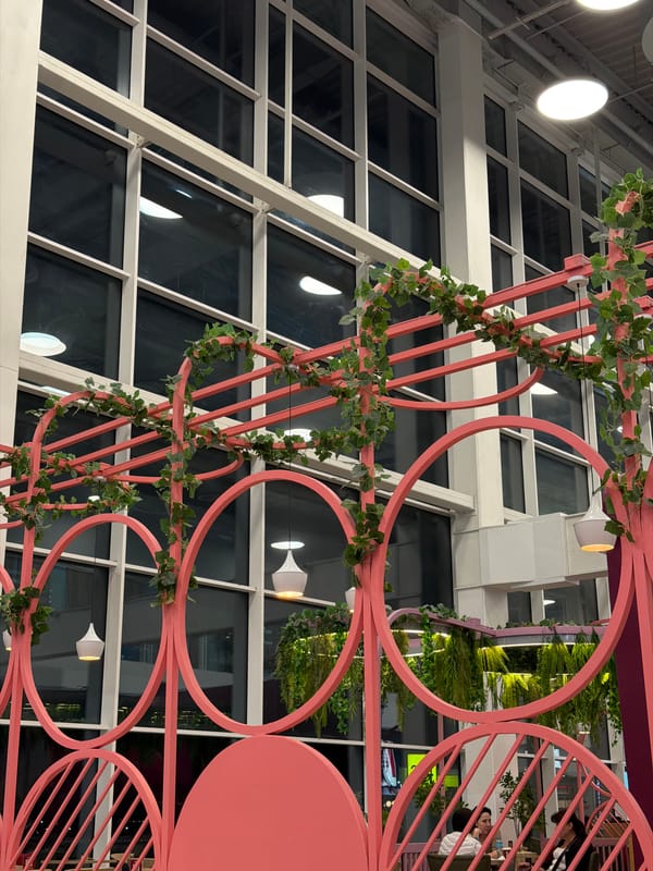 Inside a busy Almaty terminal mall: cafes, shops, and waiting areas