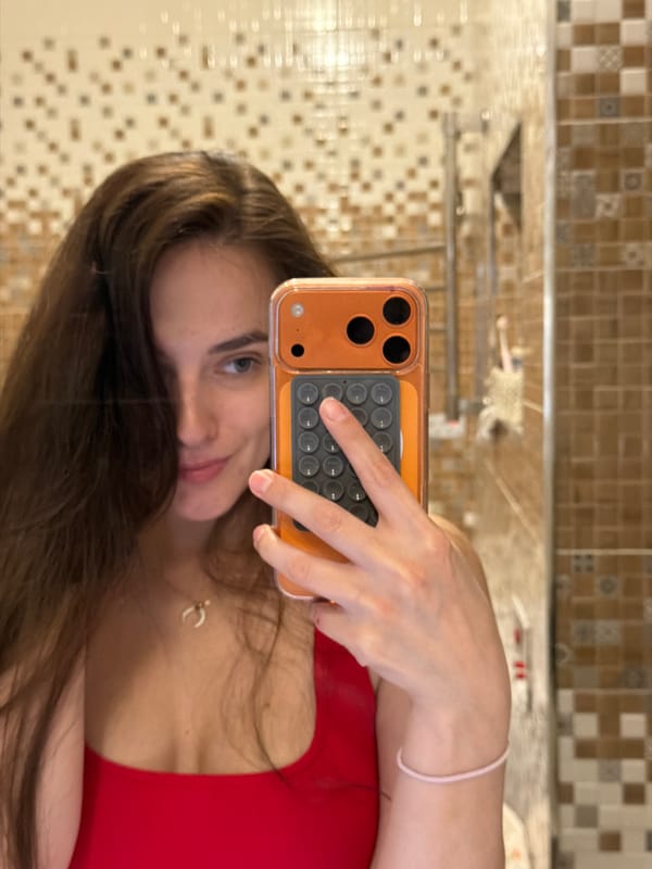 Bathroom selfie session in Ufa, one featuring a high leg raise
