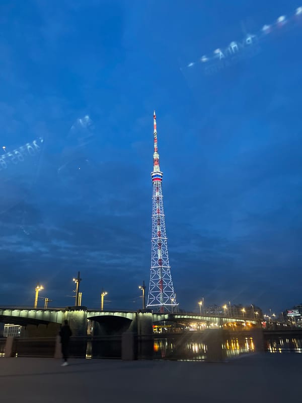 Saint Petersburg TV Tower glows red and white at night