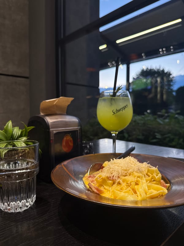 Restaurant meal documented in Blagoevgrad featuring pasta and cocktails