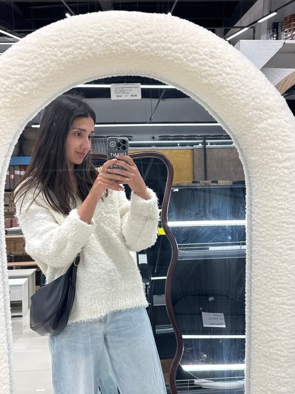 Woman Takes Tilted Mirror Selfie in Montenegro