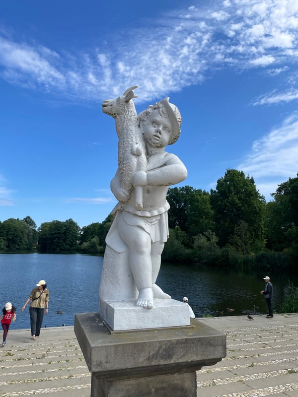 Neoclassical statues and architecture along Berlin's waterfront