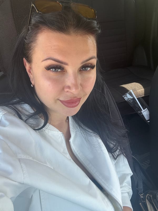 Woman in white jacket observed in vehicle in Vladivostok