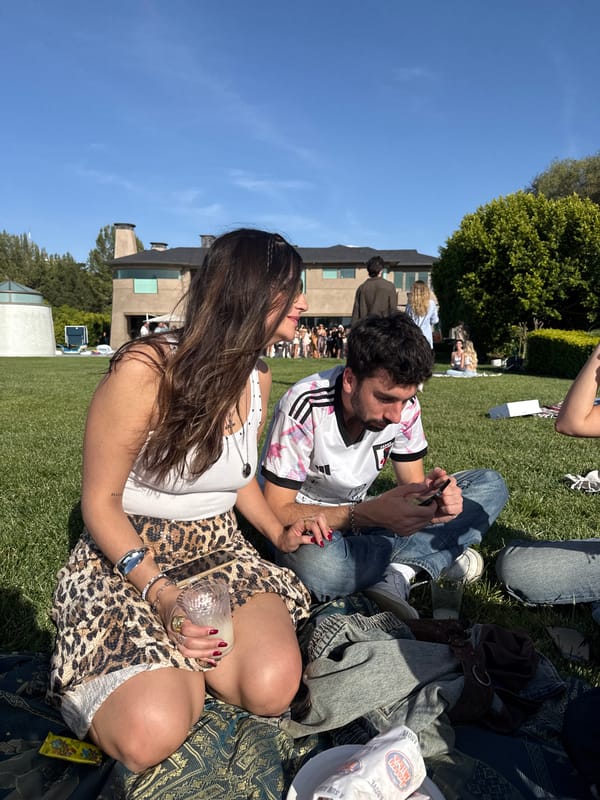 People gather on sunny Los Angeles lawn