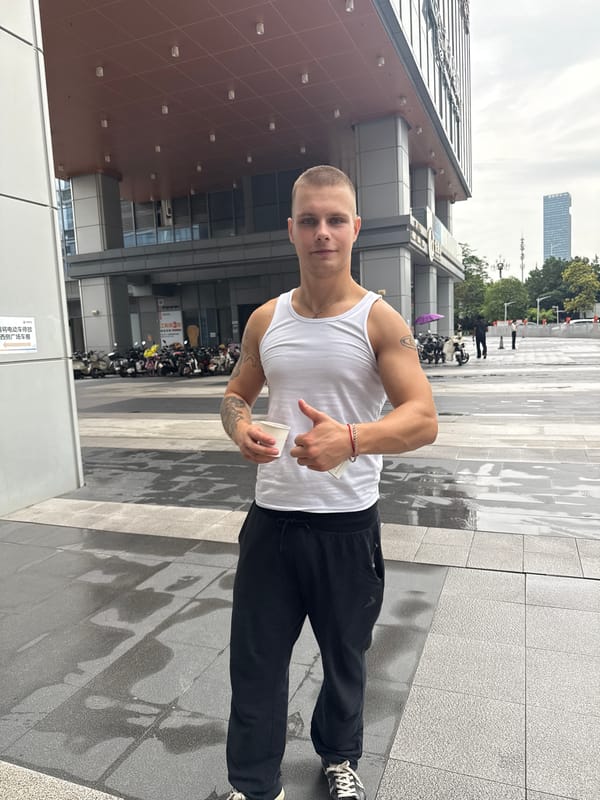 Tourist documents morning walk through modern Huangpu District