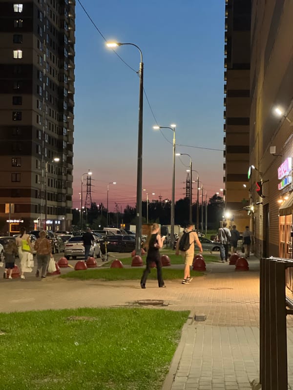Evening street scene in a Sinyavino residential district