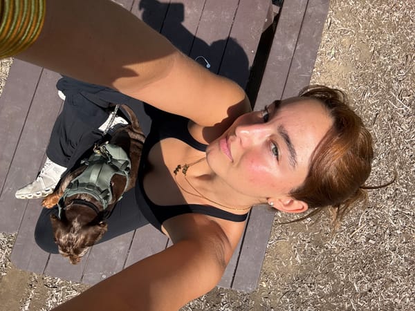 Woman documents park visit with dog at Los Angeles pond