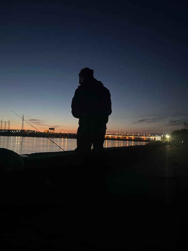Twilight fishing scene captured in Noviy, Russia
